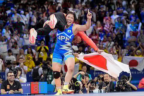 Paris Olympics women's freestyle 76kg final wrestling: Japan's Yuka Kagami celebrates winning gold
